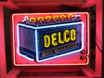 New Delco Batteries "Dry Charge" Porcelain Sign with Neon - 28"W x 20"H 