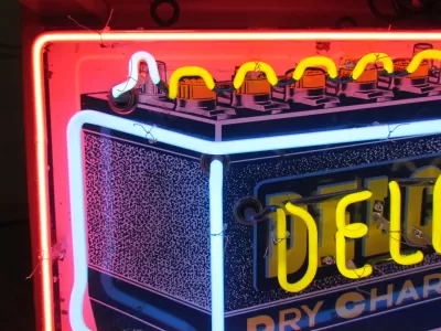New Delco Batteries "Dry Charge" Porcelain Sign with Neon - 28"W x 20"H 