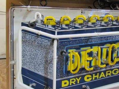 New Delco Batteries "Dry Charge" Porcelain Sign with Neon - 28"W x 20"H 