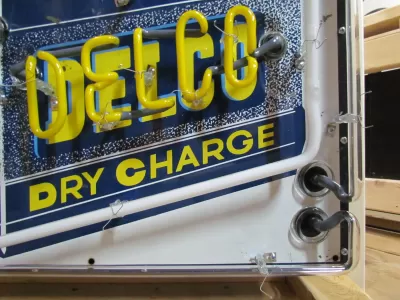 New Delco Batteries "Dry Charge" Porcelain Sign with Neon - 28"W x 20"H 
