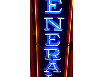 Original General Tires Porcelain Sign with Neon 16 IN W x 72 IN H 