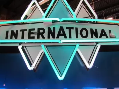 New International Trucks Logo Porcelain Neon Sign 48 IN W x 30 IN H