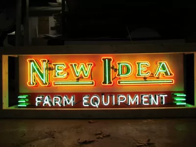 New New Idea Farm Equipment Porcelain Sign with Triple Stroke Neon 72"W x 24"H 