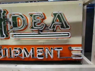 New New Idea Farm Equipment Porcelain Sign with Triple Stroke Neon 72"W x 24"H 