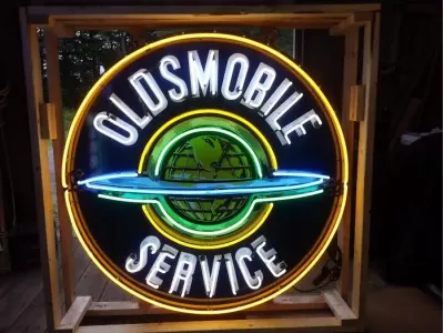 New Oldsmobile Service "The World" Porcelain Neon Sign 72" Diameter