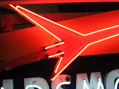 New Oldsmobile Rocket Animated Porcelain Sign with Neon 72 IN W x 38 IN H 