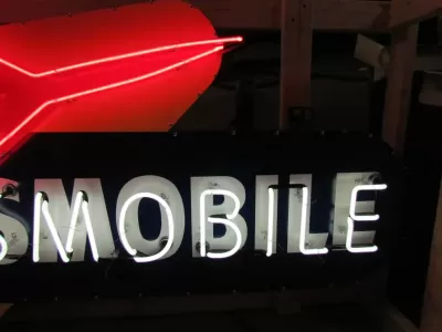 New Oldsmobile Rocket Animated Porcelain Sign with Neon 72 IN W x 38 IN H 