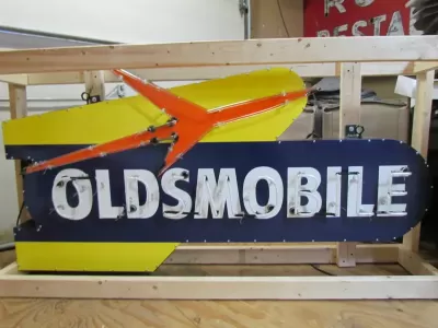 New Oldsmobile Rocket Animated Porcelain Sign with Neon 72 IN W x 38 IN H 