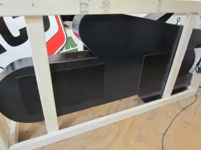 New Oldsmobile Rocket Animated Porcelain Sign with Neon 72 IN W x 38 IN H 