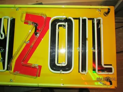 Original Pennzoil Tin Sign with Neon 58"W x 23"H