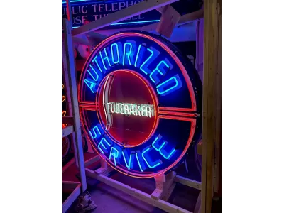 New Studebaker Authorized Service Porcelain Sign with Neon 72 IN Diameter