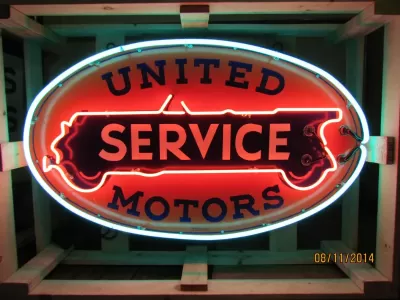 New United Motors Double-Sided Porcelain Neon Sign 48"W x 28"H