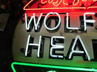New "Ask for Wolf's Head Oil" Porcelain Neon Sign - 36" Diameter